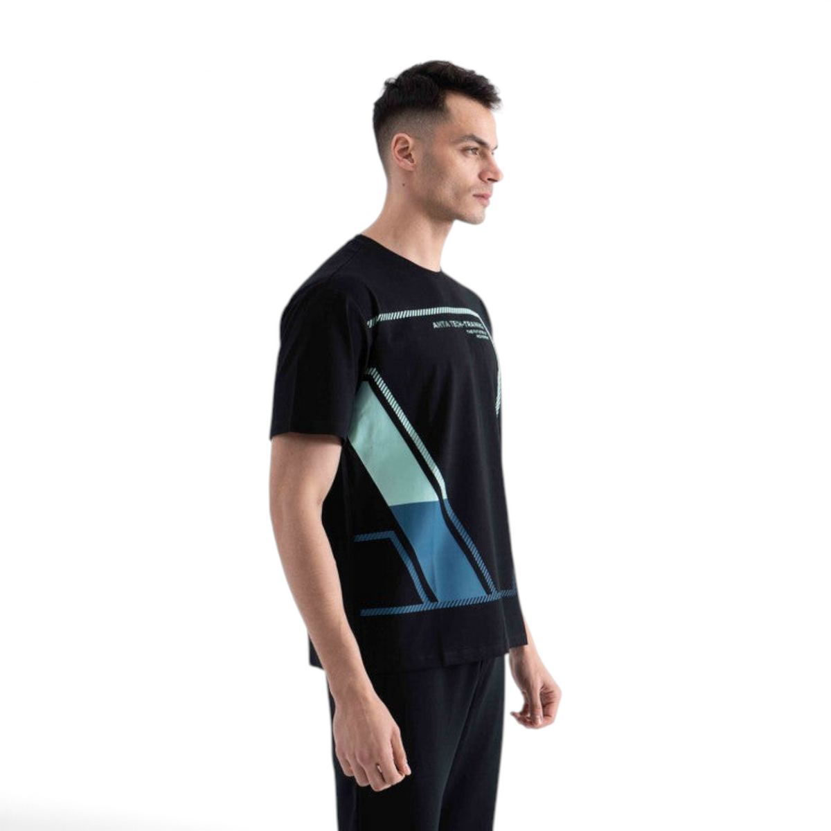 FRG black short sleeve t-shirt with geometric blue and teal graphic print worn by a male model