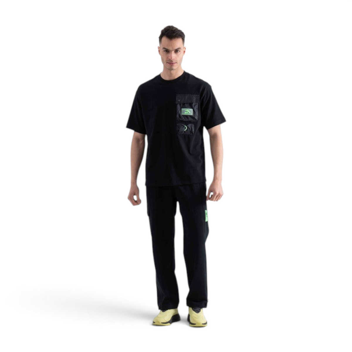 FRG short sleeve black t-shirt with a utility chest pocket and neon green accents worn by a male model