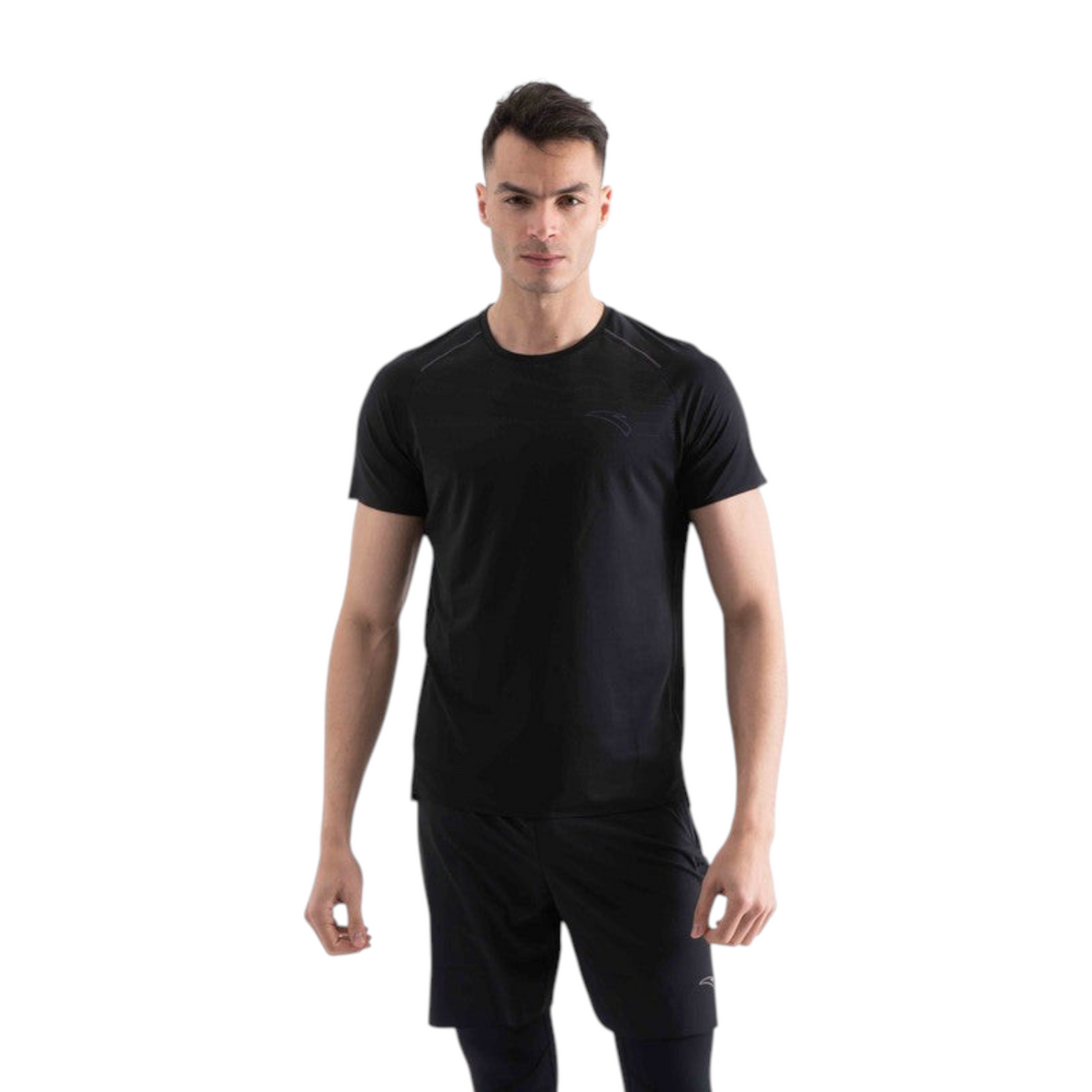 A male model wearing a black FRG short-sleeve athletic t-shirt with subtle reflective detailing.