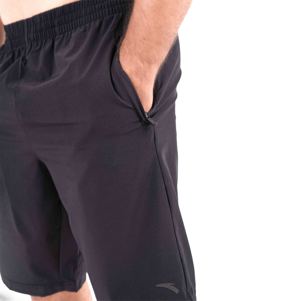 FRG black athletic half pants with an elastic waistband and a convenient zippered side pocket