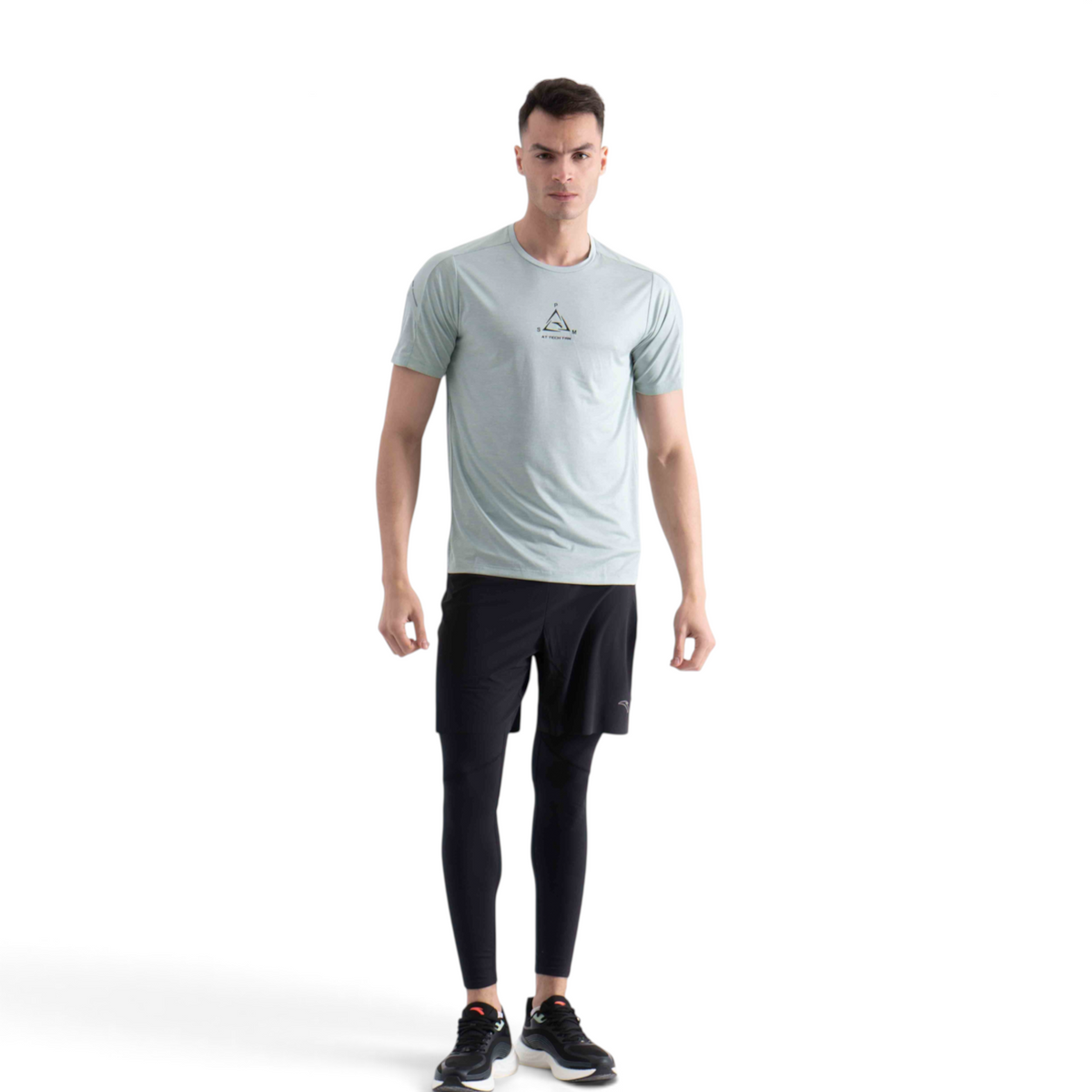 FRG light green short sleeve athletic t-shirt with a small chest logo worn by a male model with black leggings