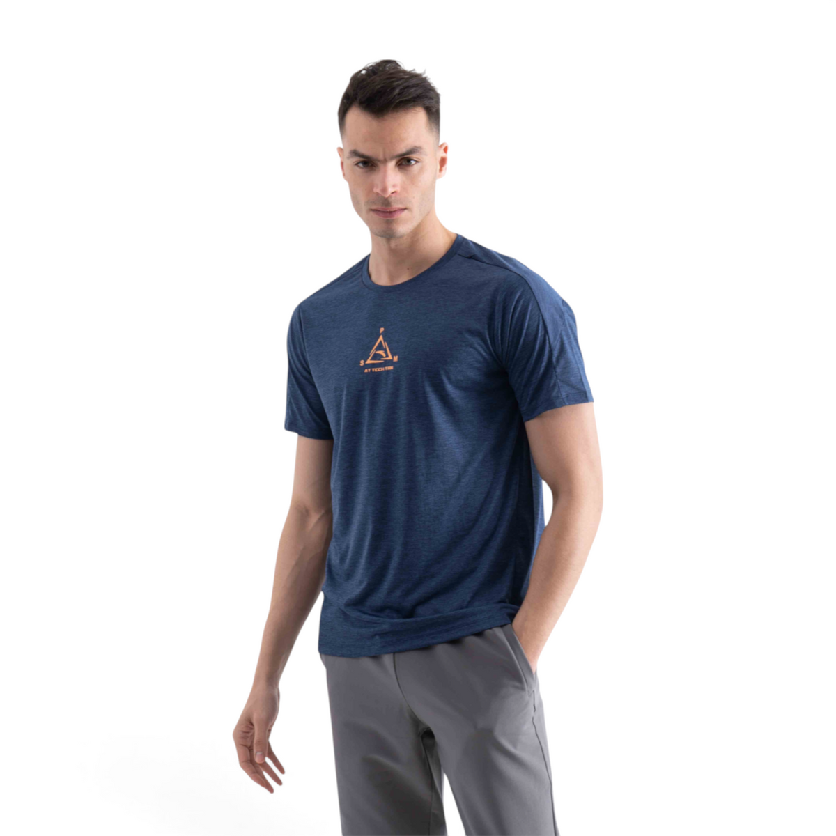 A man wearing a FRG blue heathered cross training t-shirt with an orange geometric logo on the chest.