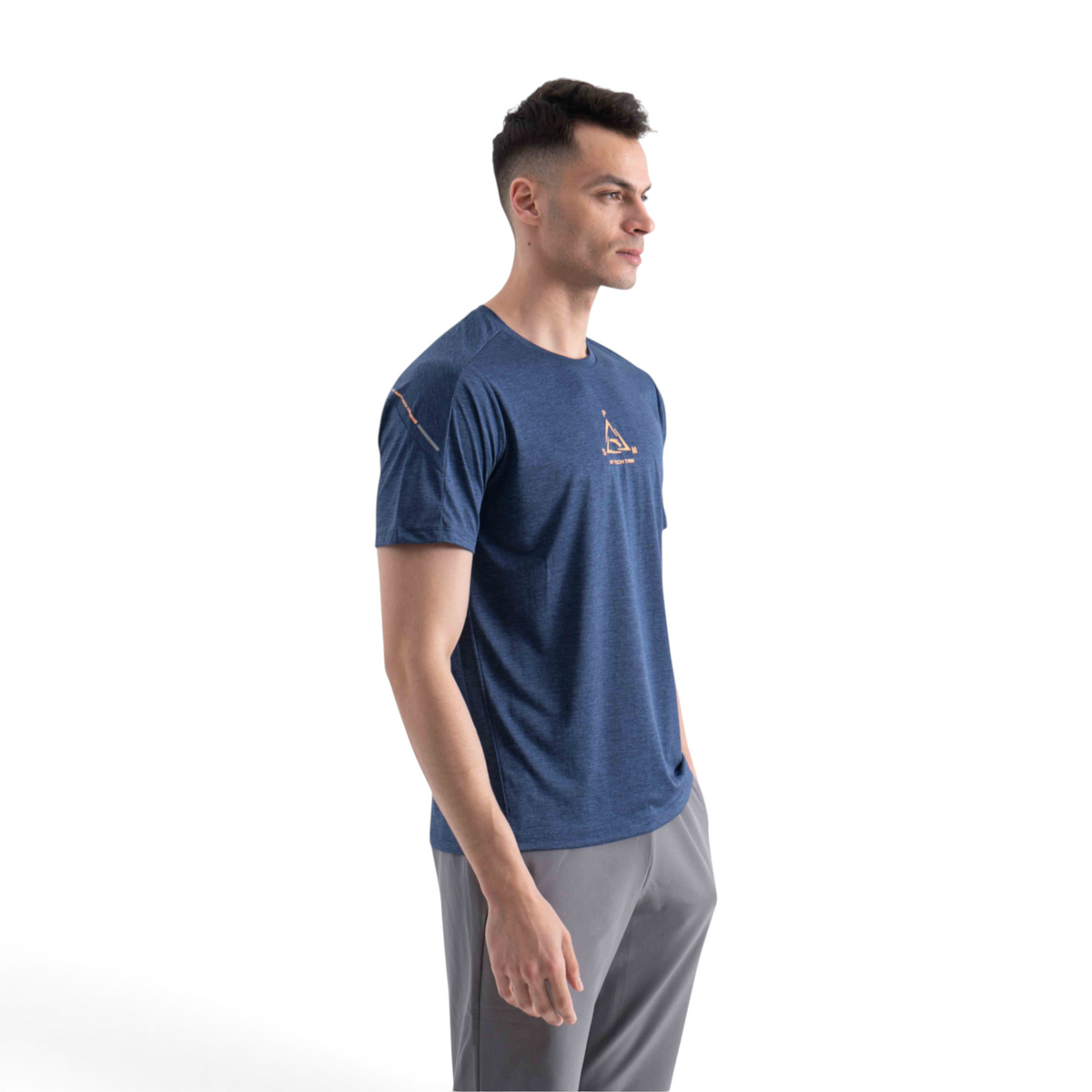 FRG blue cross training t-shirt with orange logo detail worn by a man against a white background