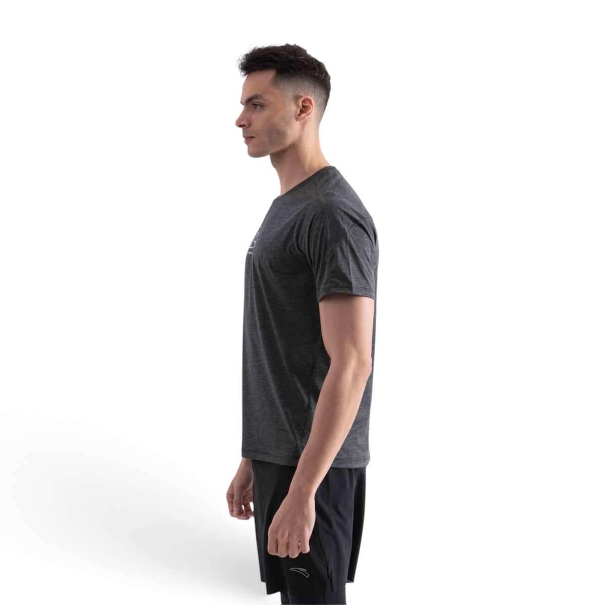FRG men's charcoal grey short sleeve athletic t-shirt worn by a model in profile view against a white background