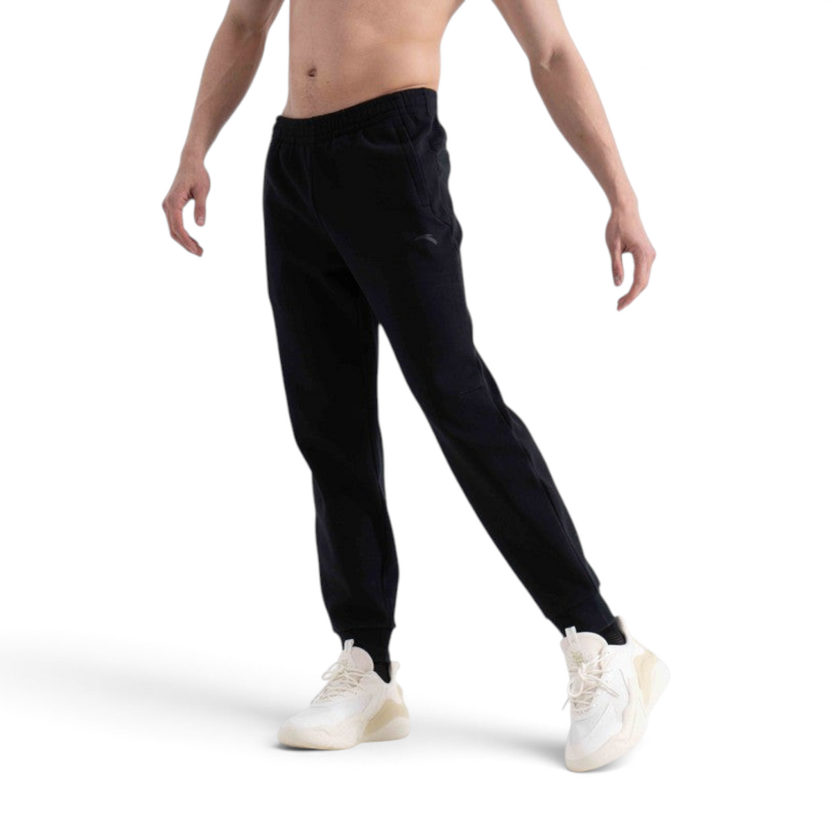 FRG men's black knit track pants for cross training, featuring an elastic waistband and comfortable tapered fit.
