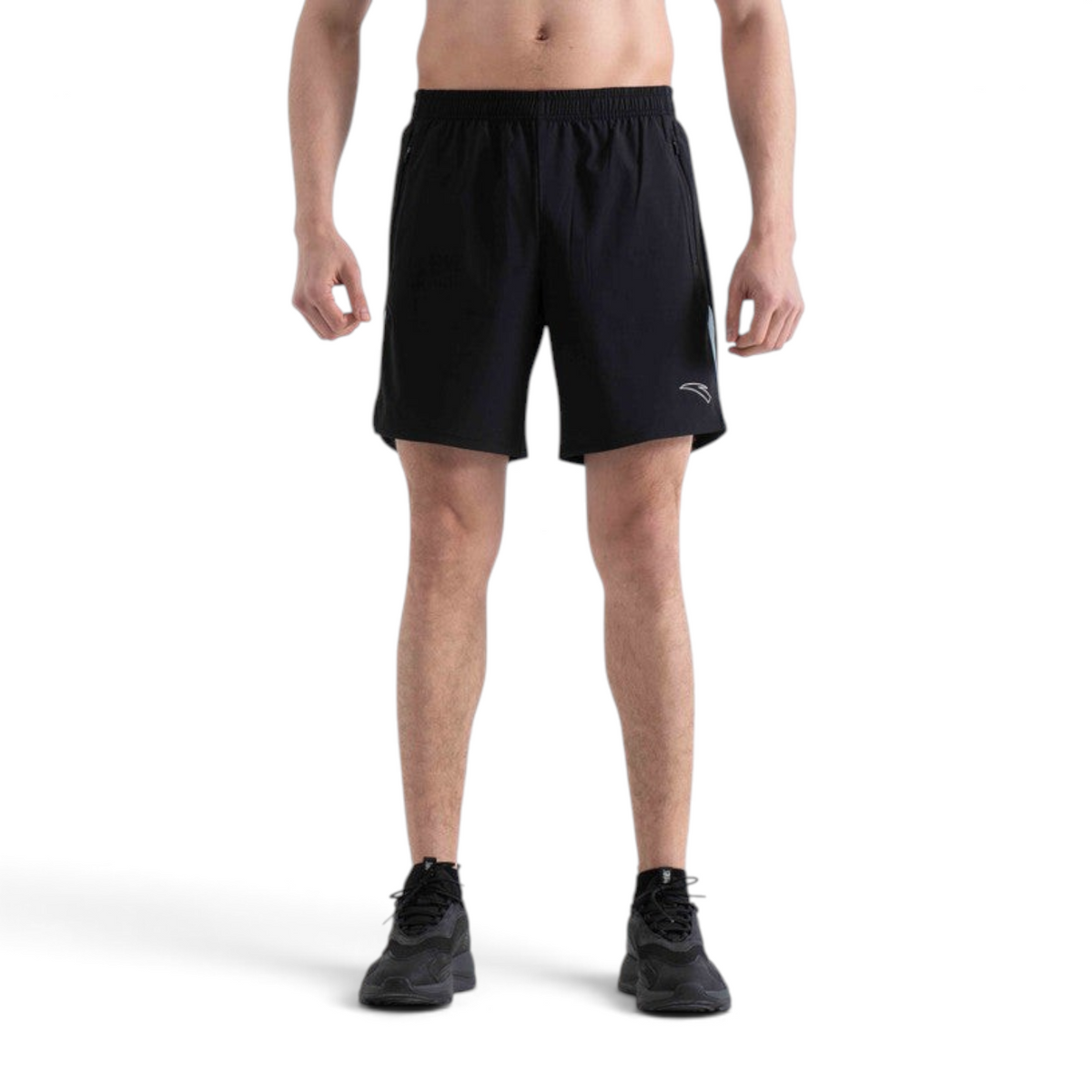 FRG black woven athletic shorts with side zip pockets and a small logo on the leg worn by a male model