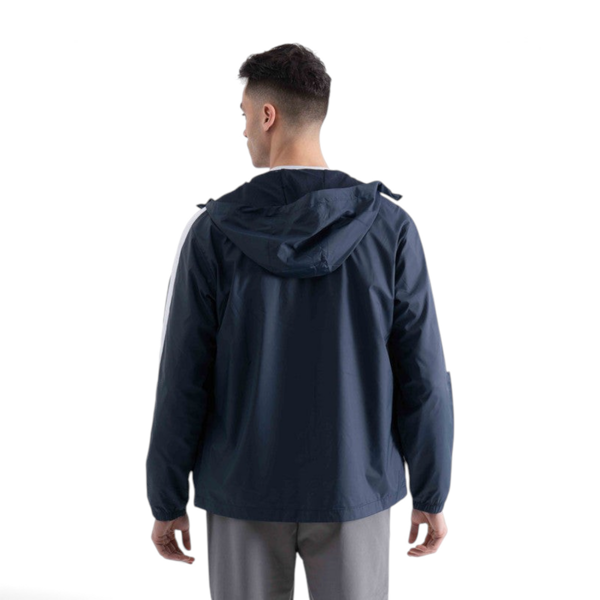 FRG navy blue hooded windbreaker jacket worn by a man, back view showing casual athletic fit