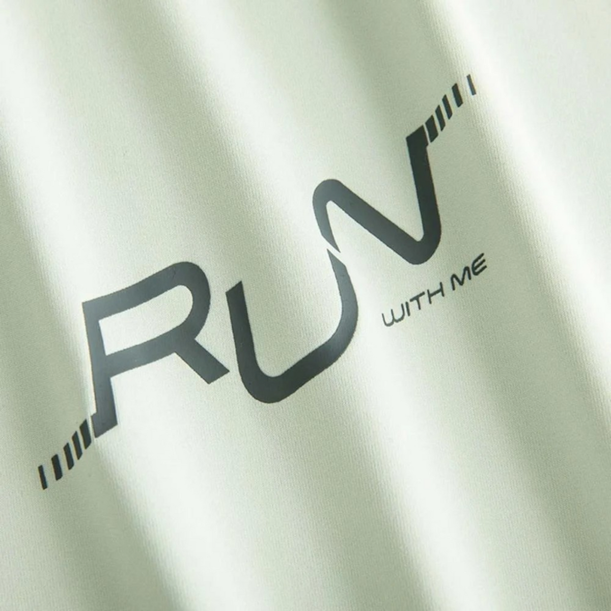 FRG Anta men's light green running t-shirt featuring a black RUN WITH ME graphic print on breathable fabric