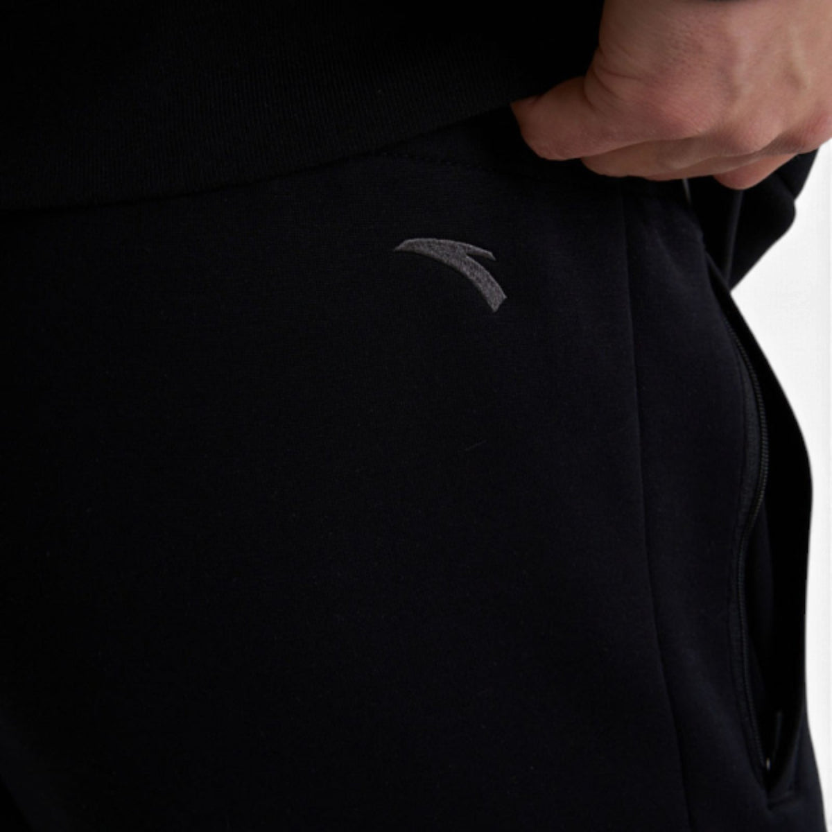 ANTA Men’s KT HOPE BLOOMS Knit Track Pants in Black – product view 4