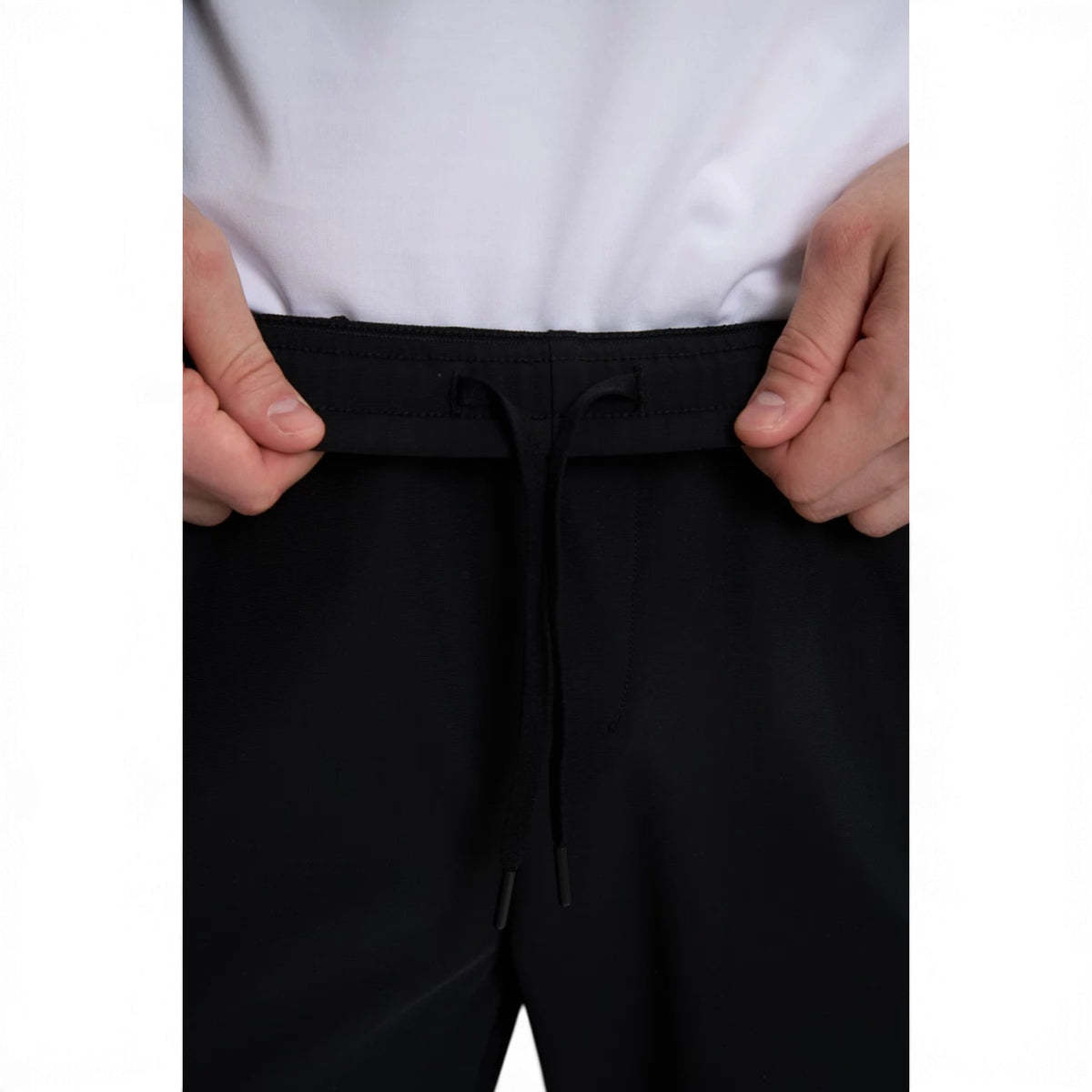 ANTA Men’s TRN Knit Track Pants in Black – product view 9