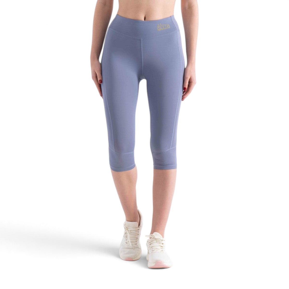 FRG Anta capri tights in light blue polyester spandex blend with a tight fit and gold logo detail
