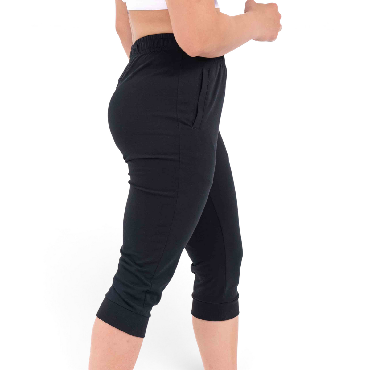 FRG Anta regular fit black capri pants made from a cotton and polyester blend, shown from a side profile view.