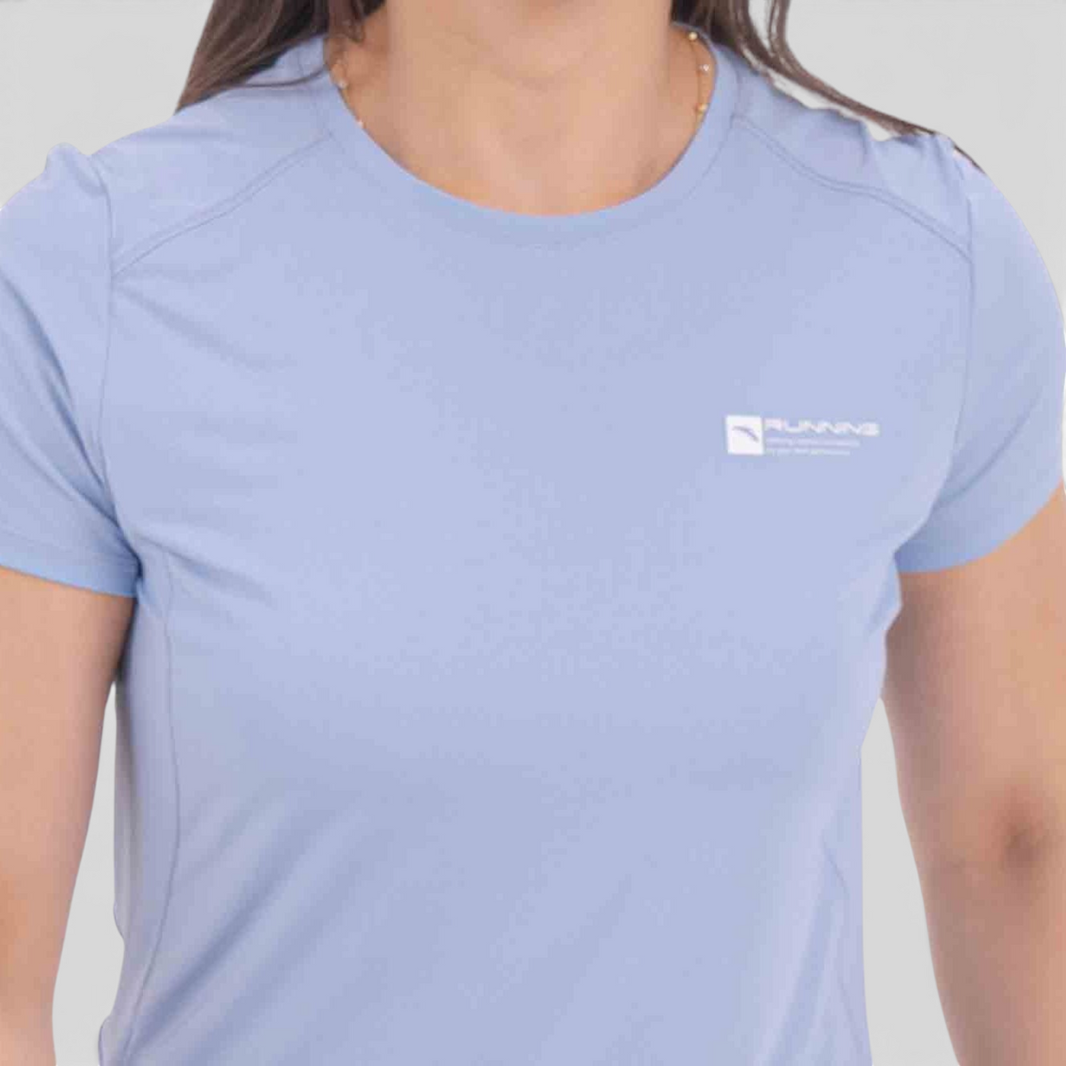FRG light blue regular fit athletic t-shirt made from a nylon polyester spandex blend with a small chest logo