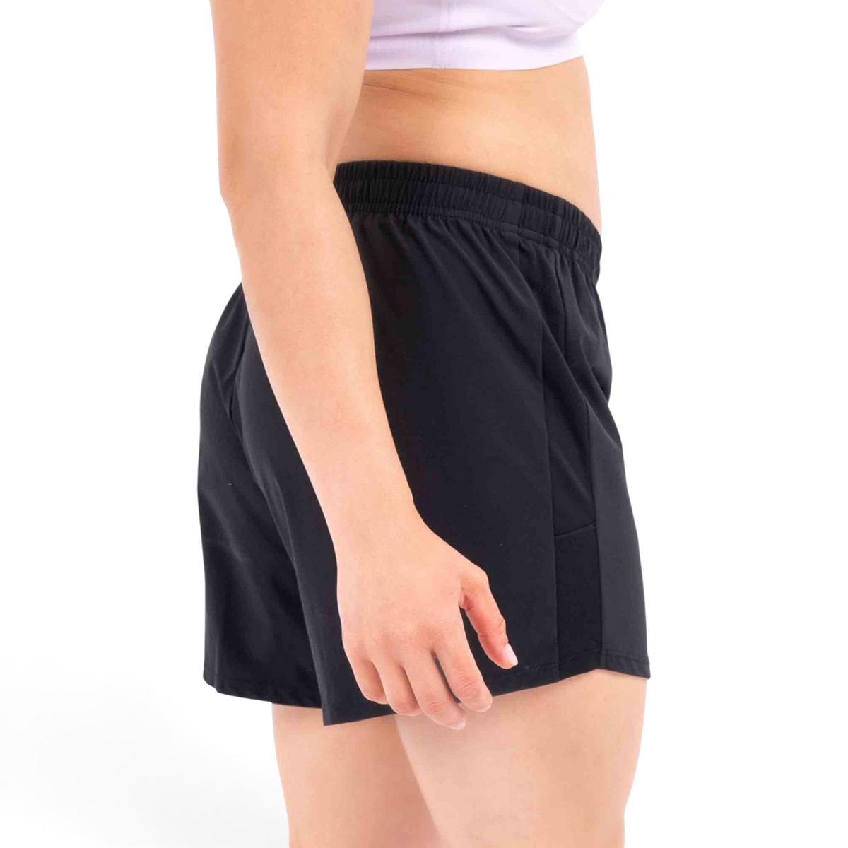 FRG black athletic shorts with an elastic waistband worn by a person in a side profile view
