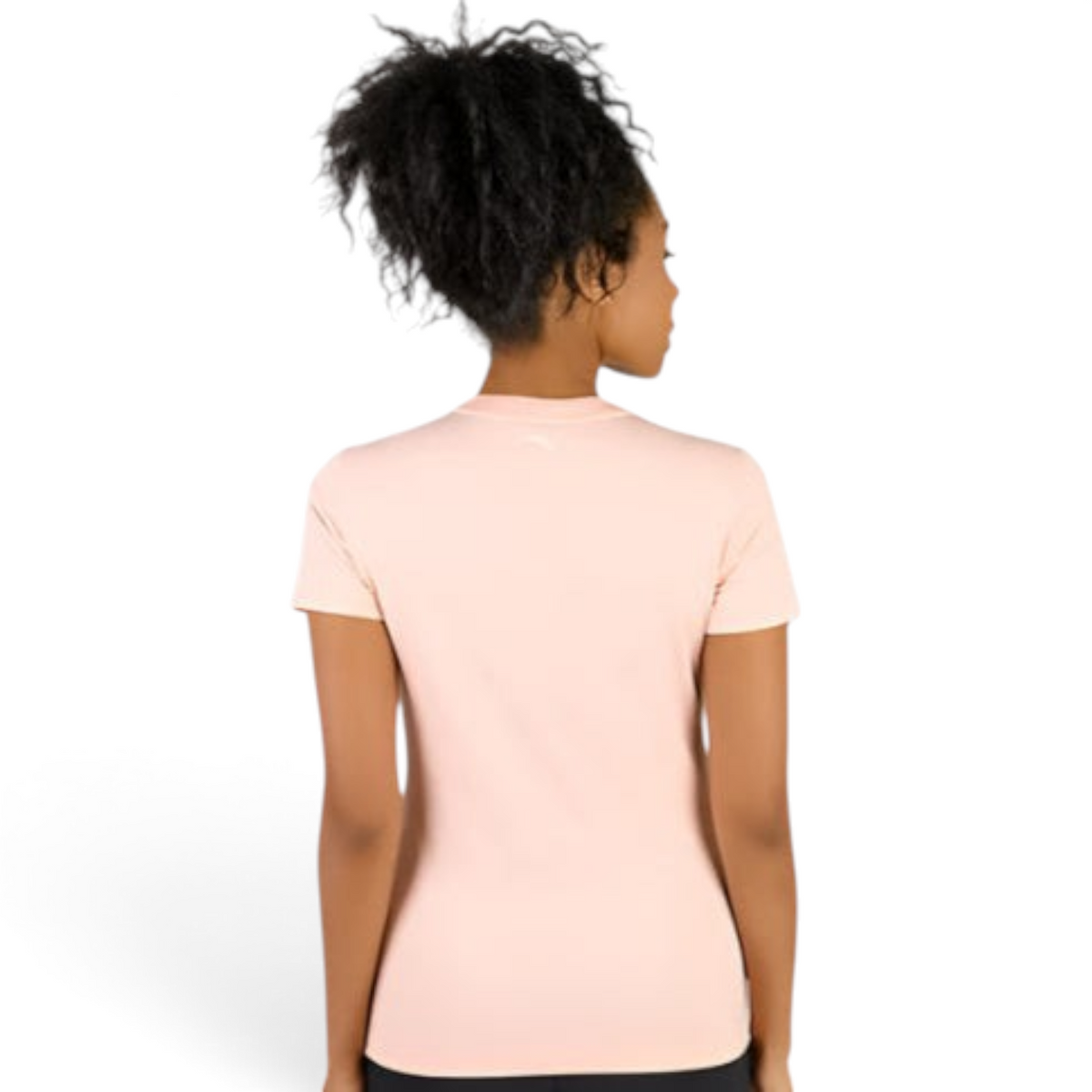 Back view of a woman wearing a plain light pink FRG T-shirt with short sleeves against a white background