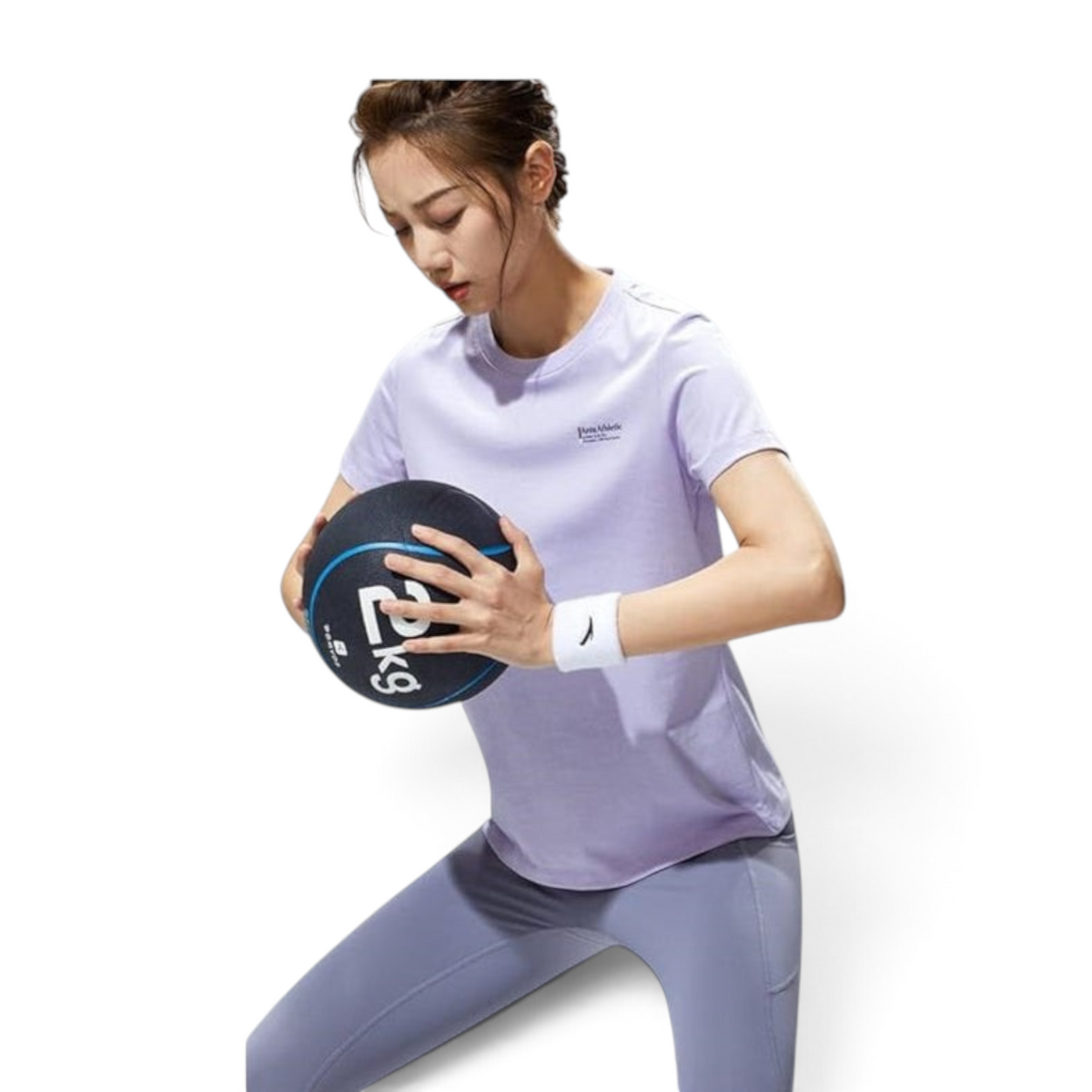 FRG light purple athletic t-shirt worn by a woman holding a medicine ball during a workout