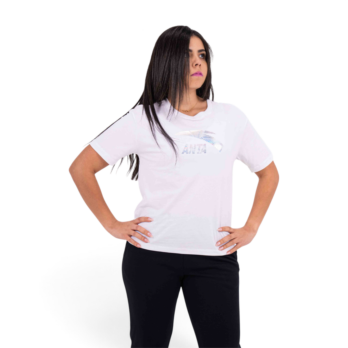 FRG white crew neck t-shirt with a metallic holographic logo graphic worn by a woman with long dark hair