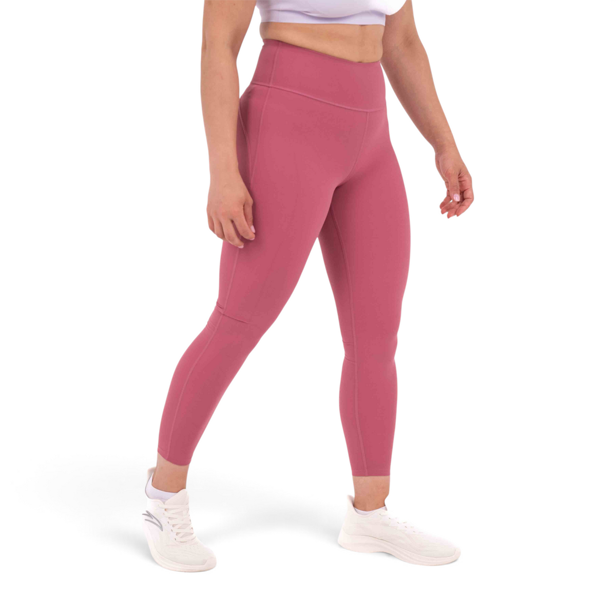 FRG slim fit ankle length leggings in dusty rose polyamide spandex blend worn by a model with white sneakers