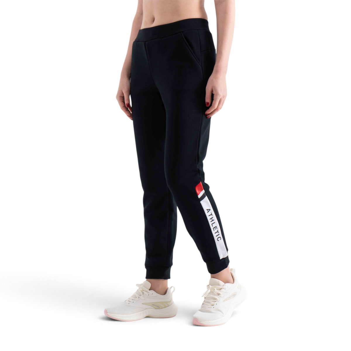 FRG regular fit black knit track pants with white and red side stripe detail and athletic text on a model