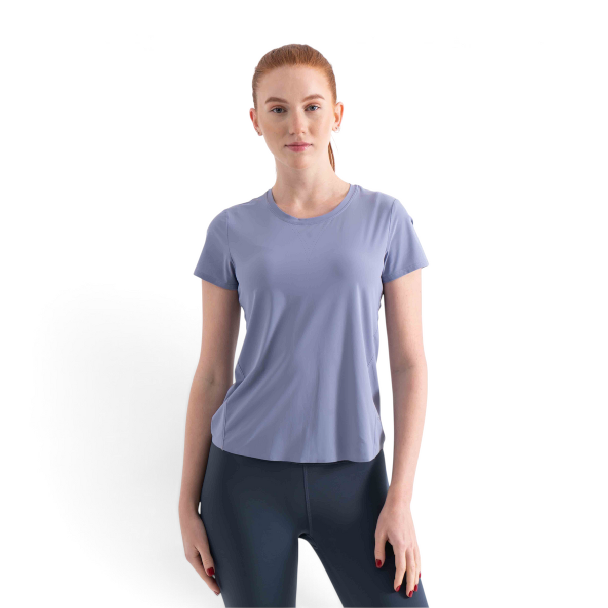 FRG SS TEE in periwinkle blue, a lightweight short-sleeve athletic shirt worn by a woman with red hair.
