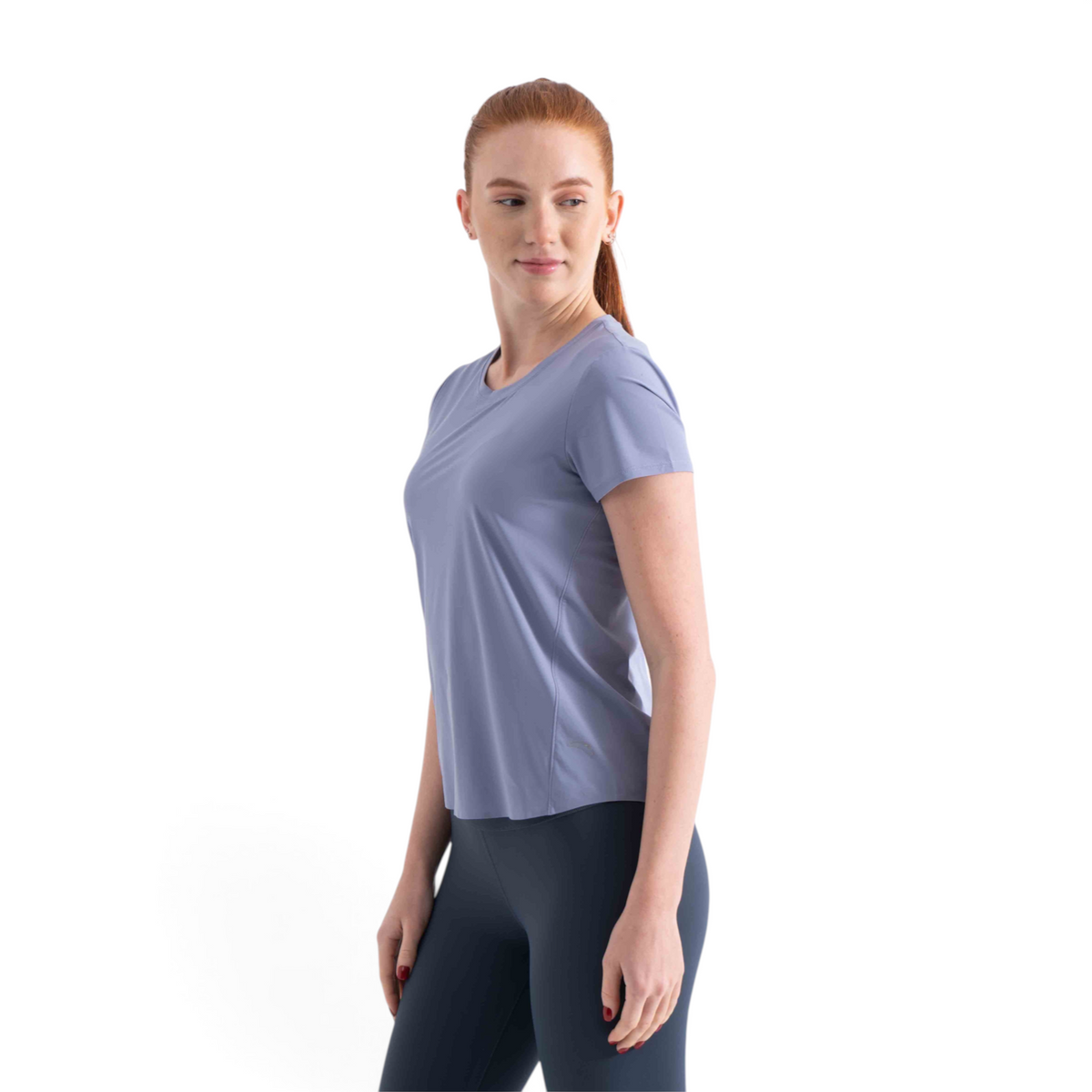 FRG women's short sleeve crew neck athletic t-shirt in light blue, worn by a model against a white background.