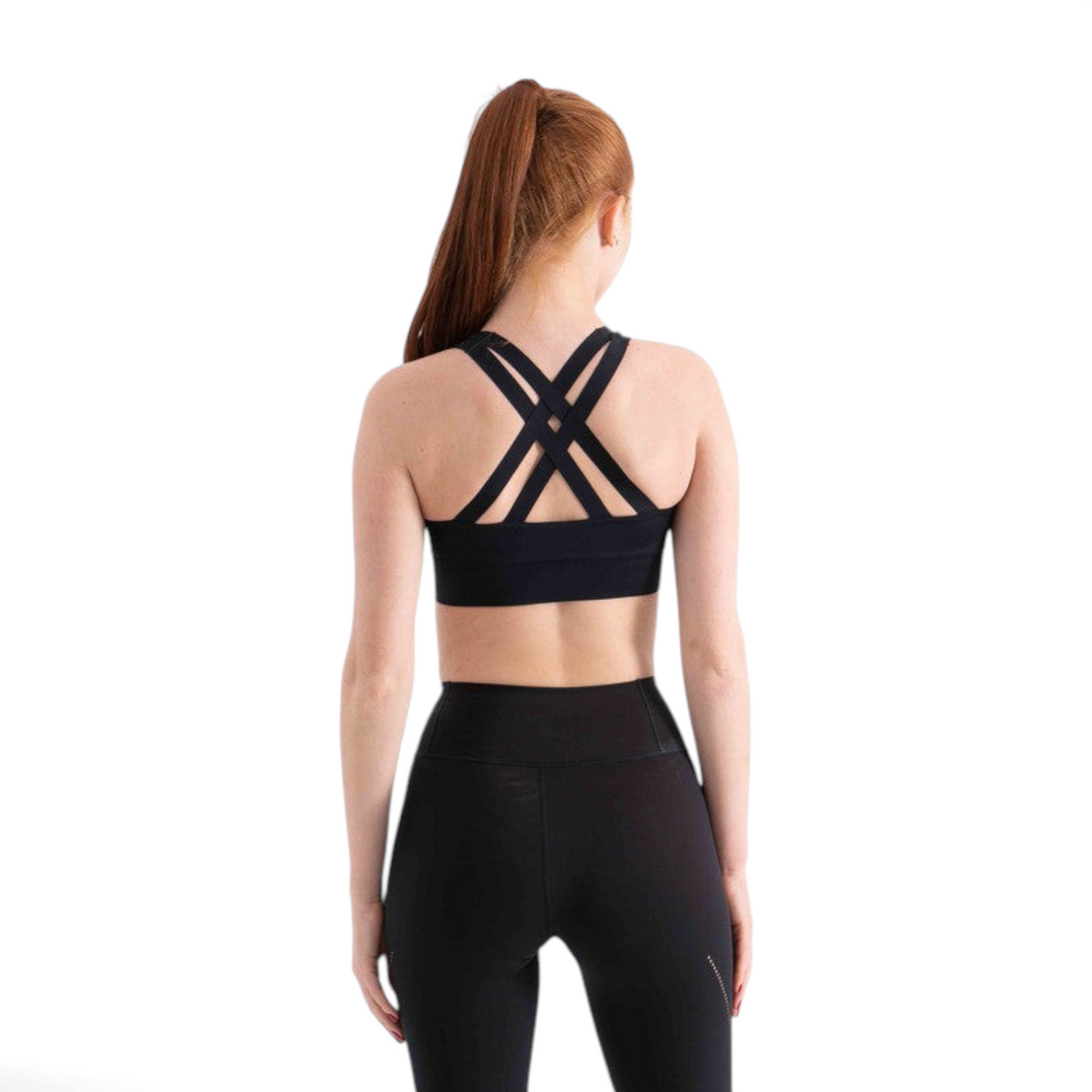 FRG black sports bra with a strappy crisscross back design worn by a woman with a ponytail