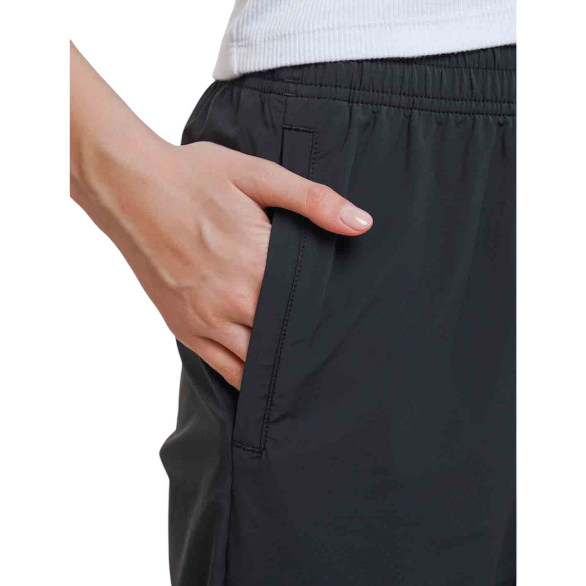 FRG black ankle pants featuring an elastic waistband and side pocket detail on a model