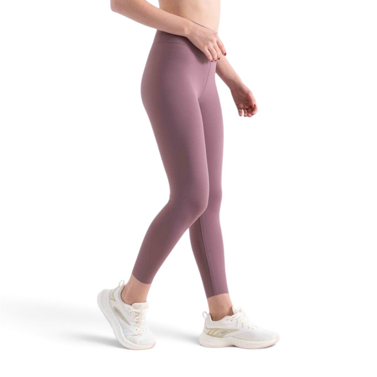 FRG tight ankle pants in dusty mauve, high-waisted athletic leggings worn with white sneakers on a white background