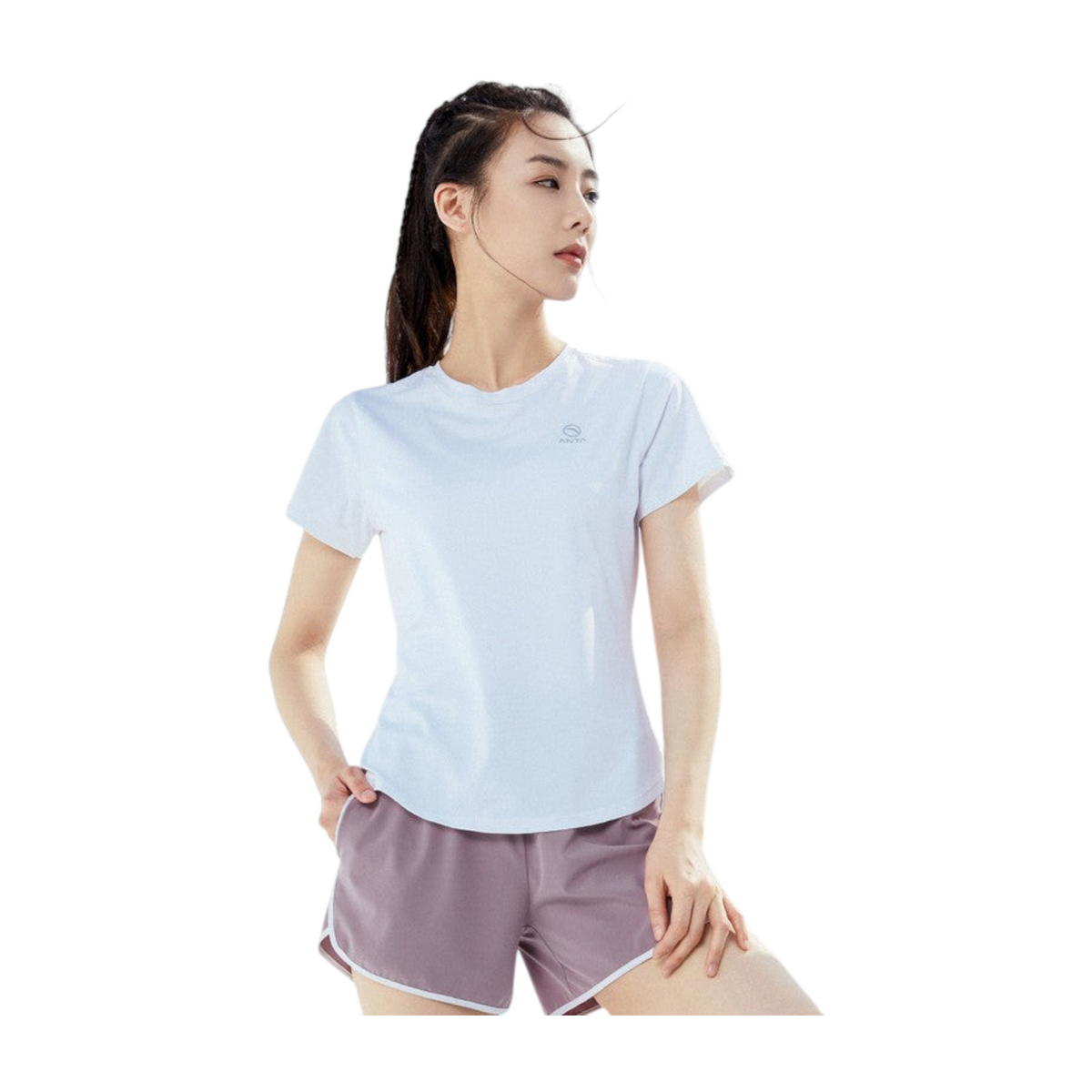 FRG ANTA snow white short sleeve cross training t-shirt worn by a woman in a bright, modern fitness setting.