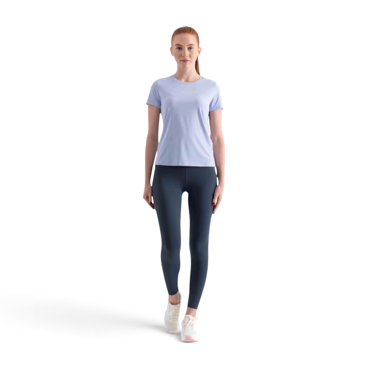 FRG model wearing a light blue short sleeve t-shirt and dark grey leggings on a white background