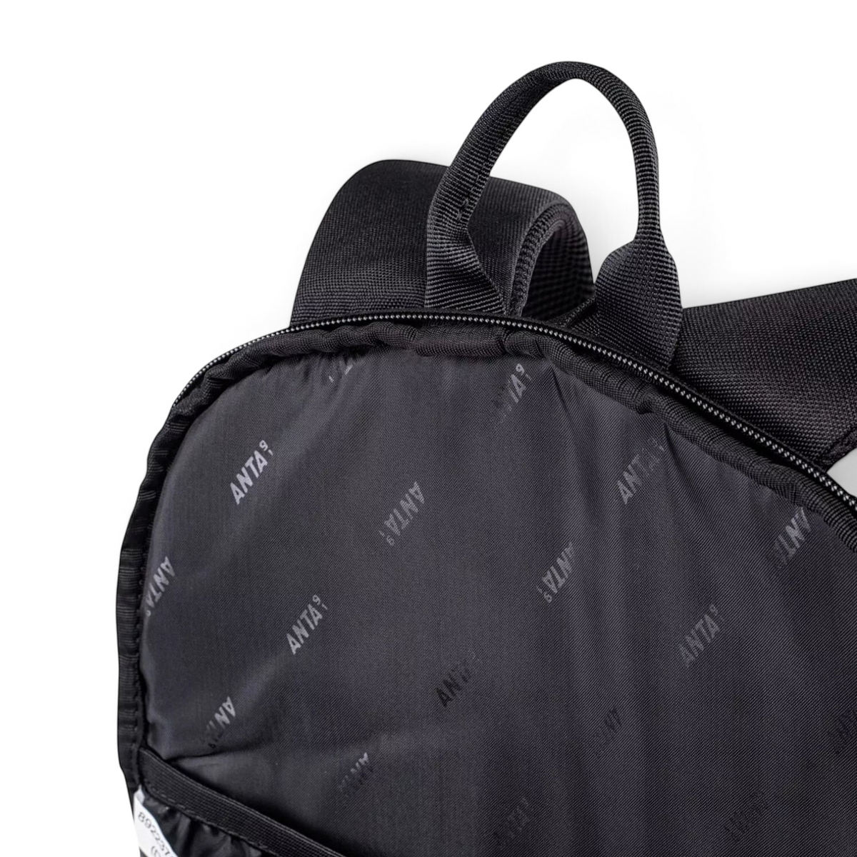 FRG black backpack featuring a top carry handle and interior lining with a repeating brand logo pattern