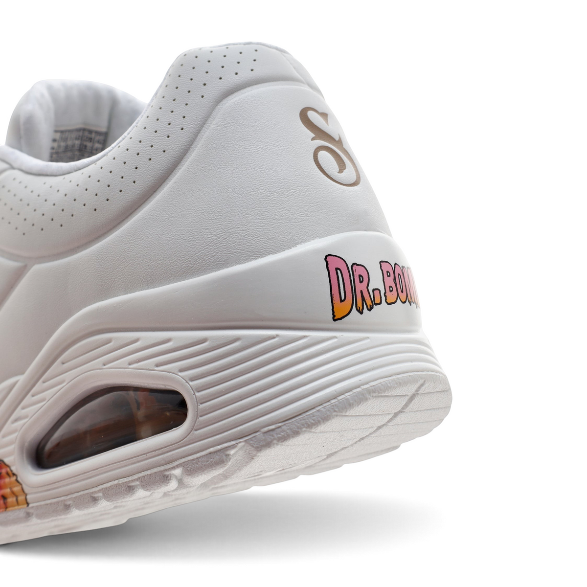 FRG UNO Dr. Bombay sneaker heel detail in white leather with a pink and orange logo and visible air cushioning unit.
