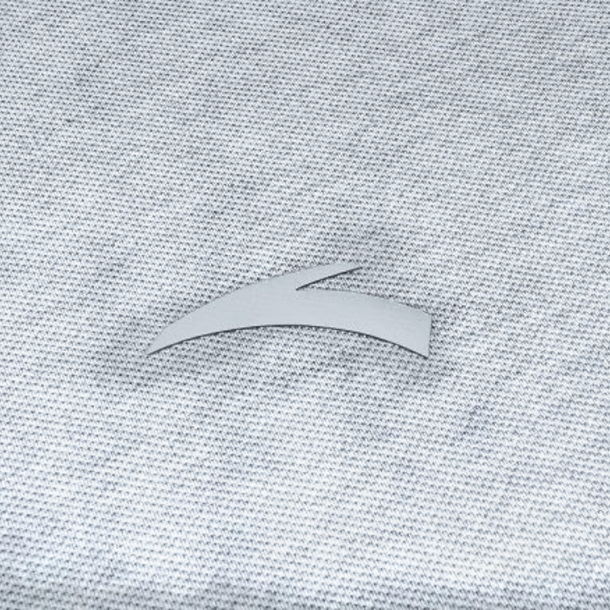 FRG SS POLO shirt in grey featuring a textured pique fabric and a silver metallic logo detail