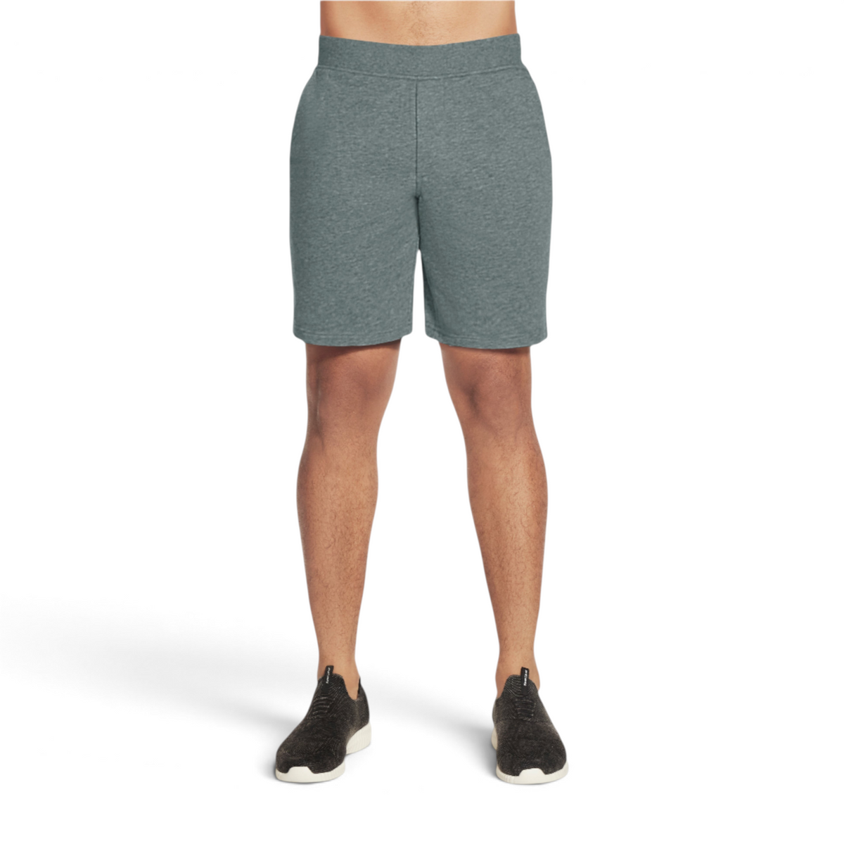 FRG men's grey knit athletic shorts with an elastic waistband, worn by a model with black sneakers.