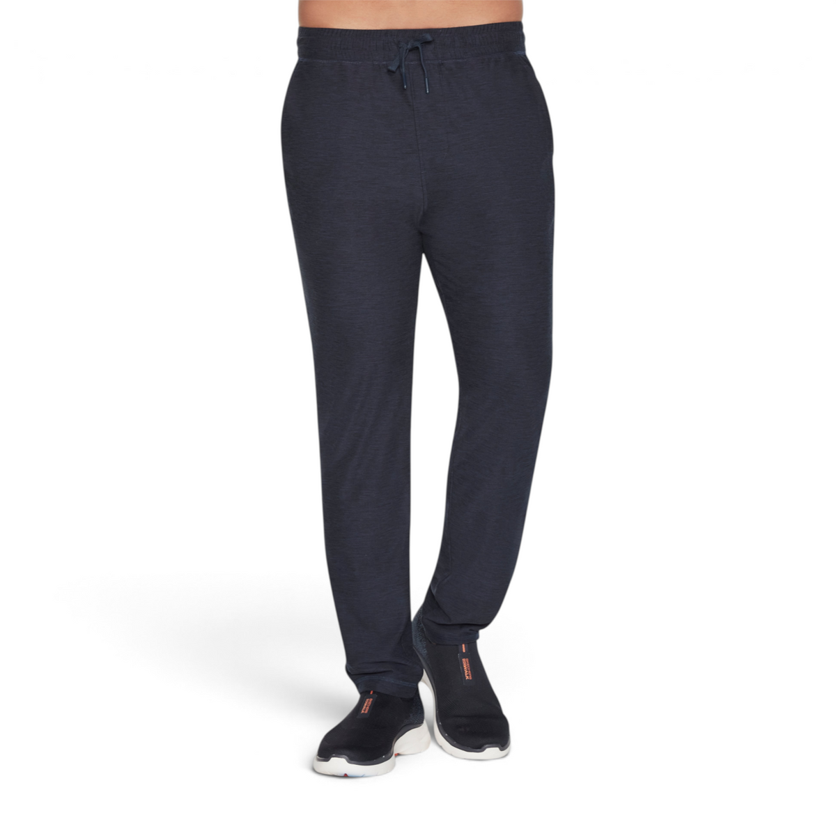 FRG SKECHKNITS ULTRA GO LITE tapered pants in dark navy blue with an elastic drawstring waist for a comfortable fit.
