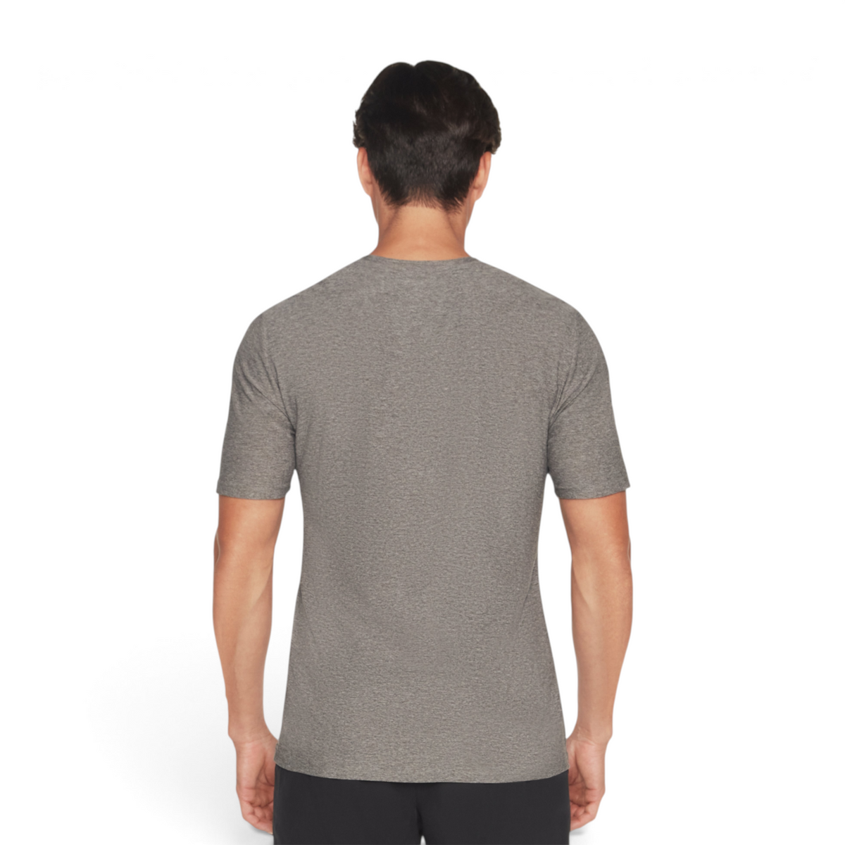Back view of a man wearing a grey FRG GODRI ALL DAY TEE made from a recycled polyester blend.