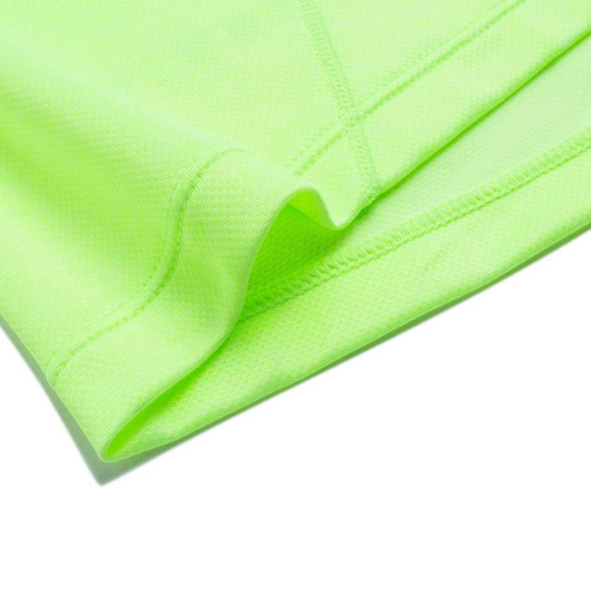 Close-up of FRG ANTA fluorescent green running t-shirt fabric showing breathable mesh texture and stitched hem