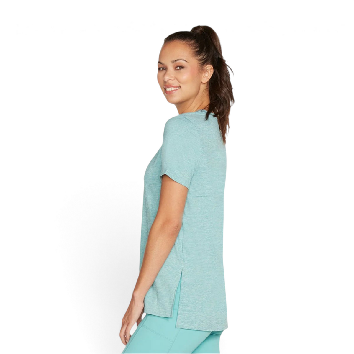 FRG women's light blue knit graphic tee with a side slit hem worn by a smiling model in a studio setting