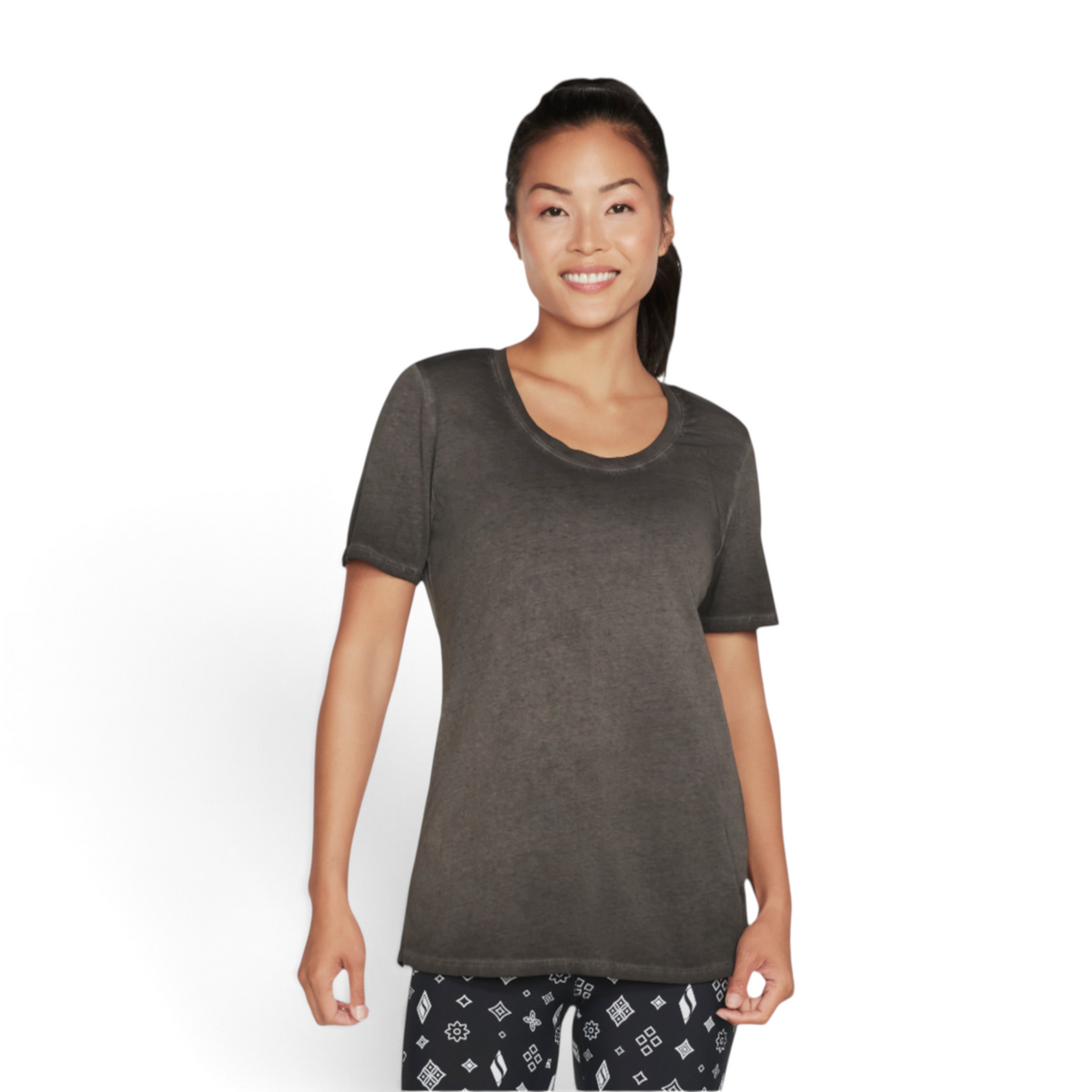 FRG women's charcoal grey knit tunic tee with a scoop neckline worn by a smiling model