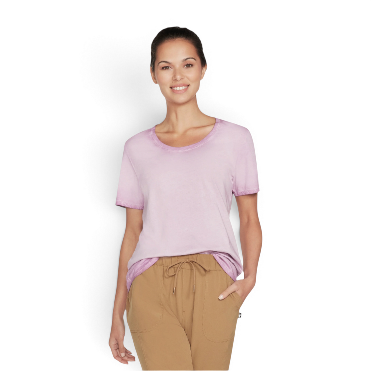 FRG women's light purple knit tunic tee with a crew neck, worn by a smiling model with tan drawstring pants.