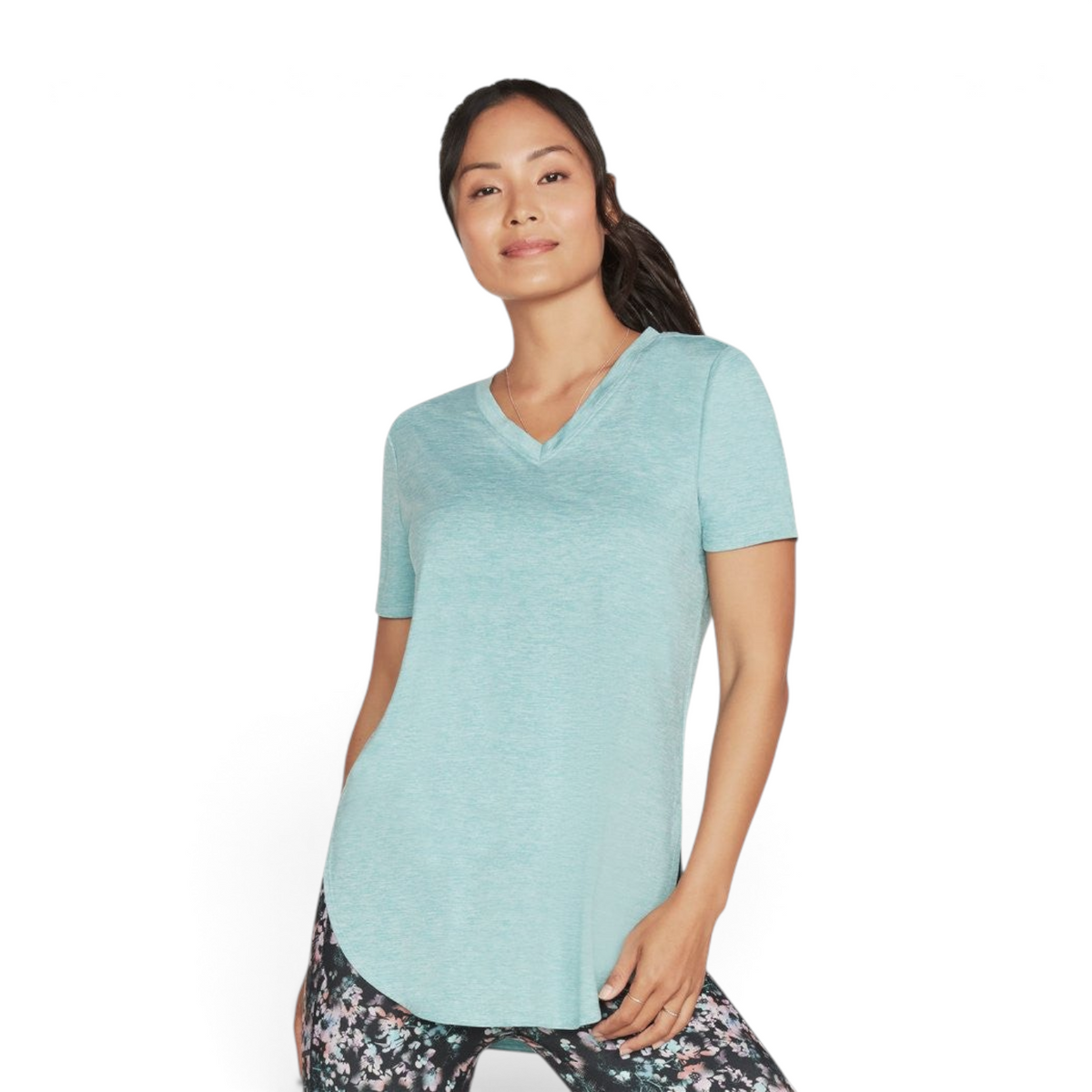 FRG Skechers GO Walk Wear porcelain blue short-sleeve knit tunic with a flattering high-low hem on a female model