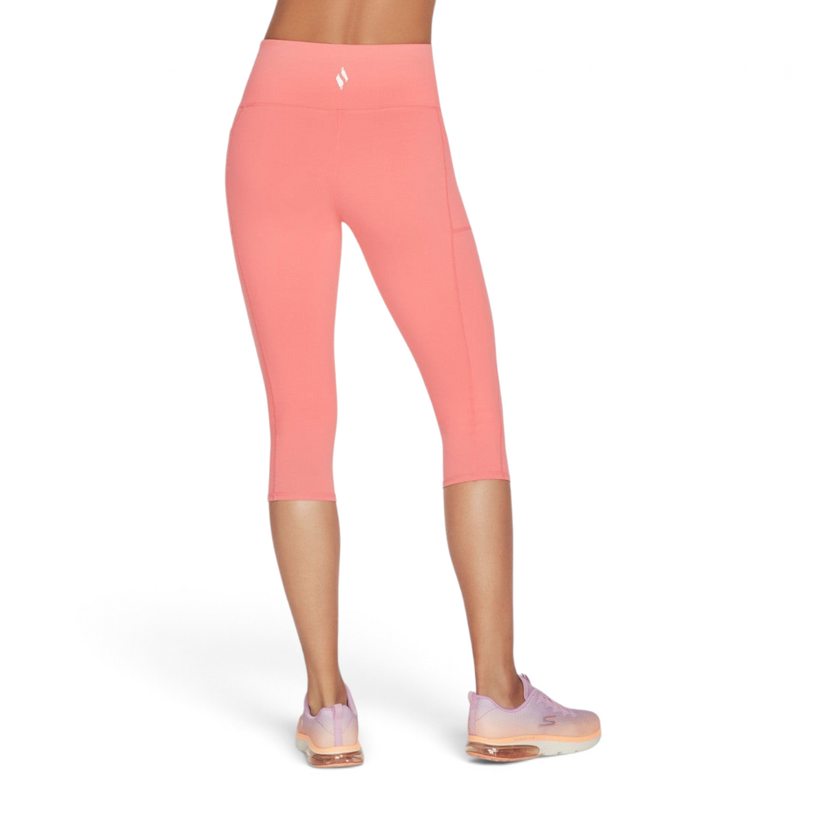 FRG women's coral knit capri leggings with a high waistband and side pockets, viewed from the back.