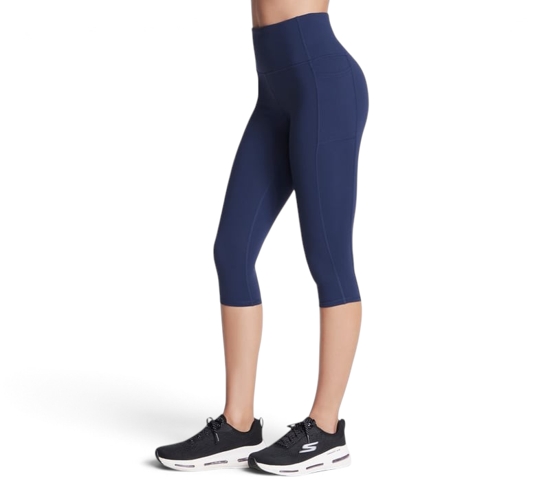 FRG Skechers women's navy high-rise knit capri leggings with side pockets worn by a model