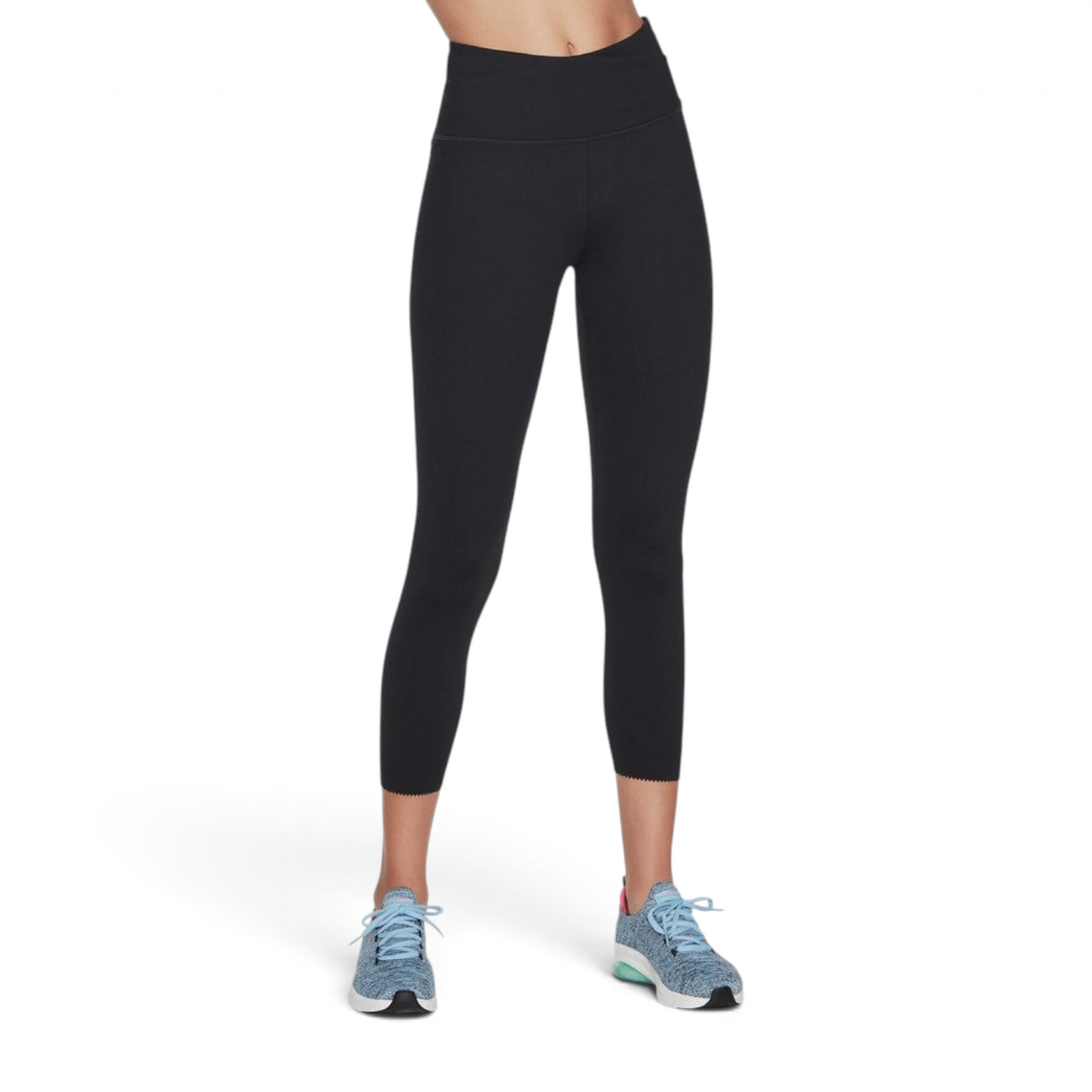 FRG Skechers GO Sculpt black high-waisted 7/8 leggings with a scalloped hem, worn with blue athletic sneakers.