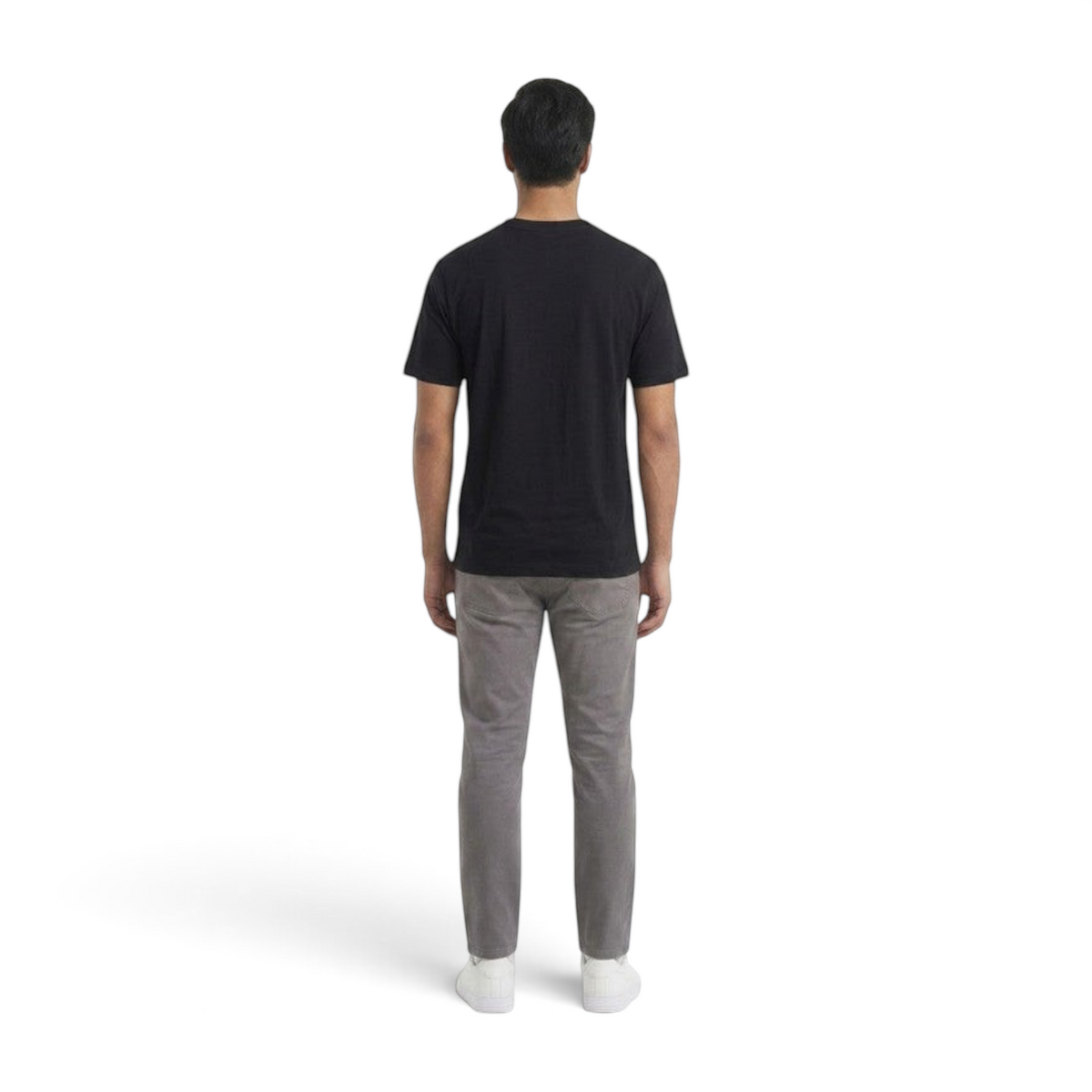 FRG ANTA black short sleeve running t-shirt worn by a man from the back view with grey trousers and white sneakers