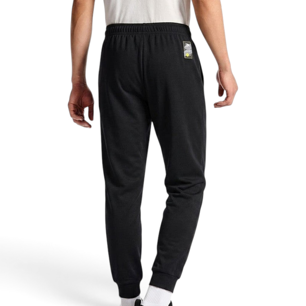 FRG ANTA black knit track pants with a comfortable elastic waistband and ribbed cuffs, shown from the back view.