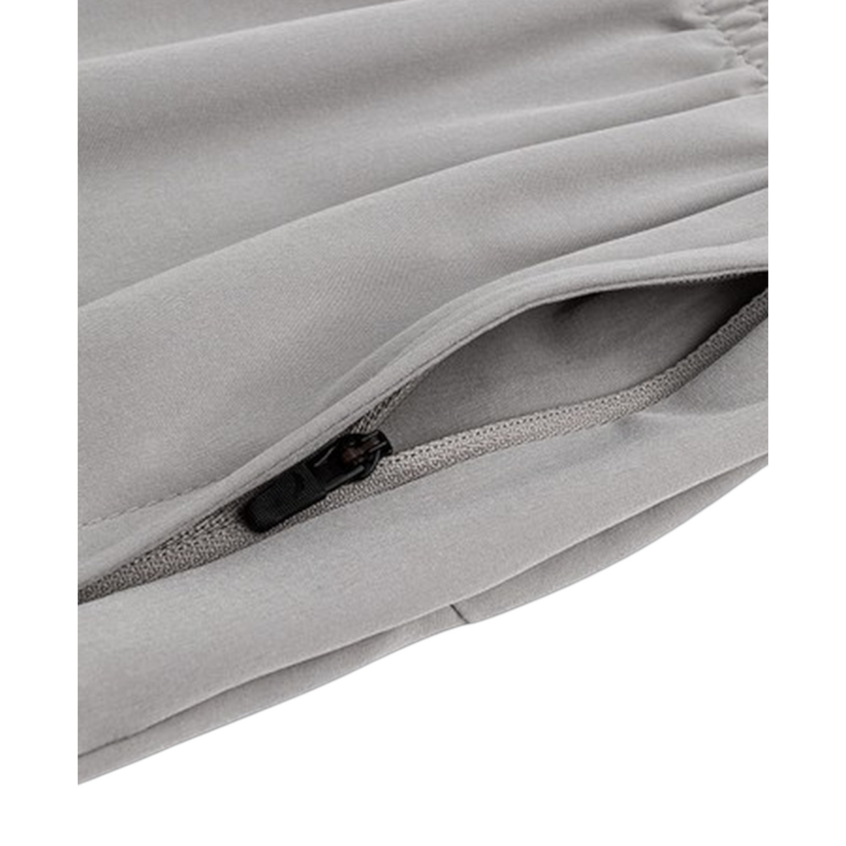 FRG Anta smoke grey woven training shorts featuring a secure zippered pocket for ventilation and comfort.