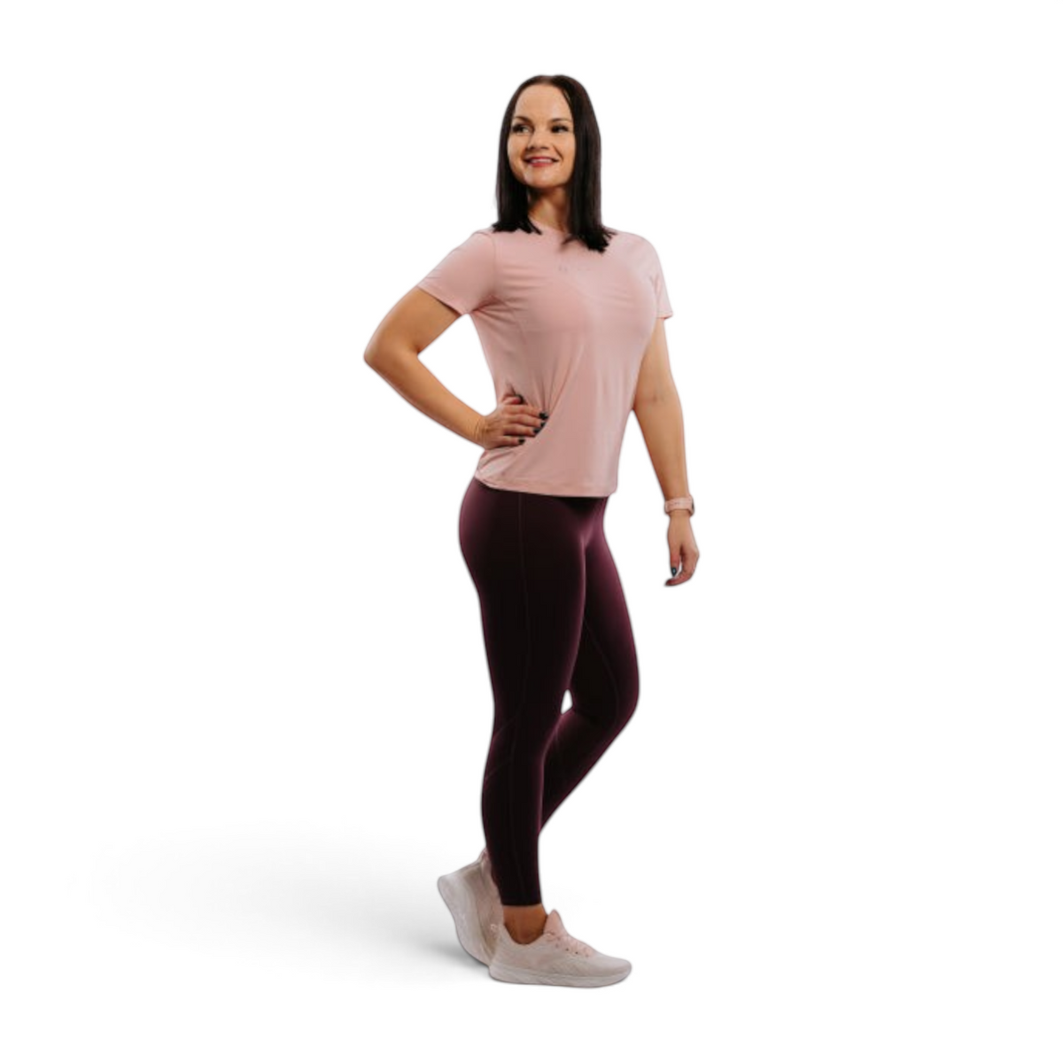 FRG model wearing ANTA purple yoga tight crop pants and a light pink t-shirt for fitness and training