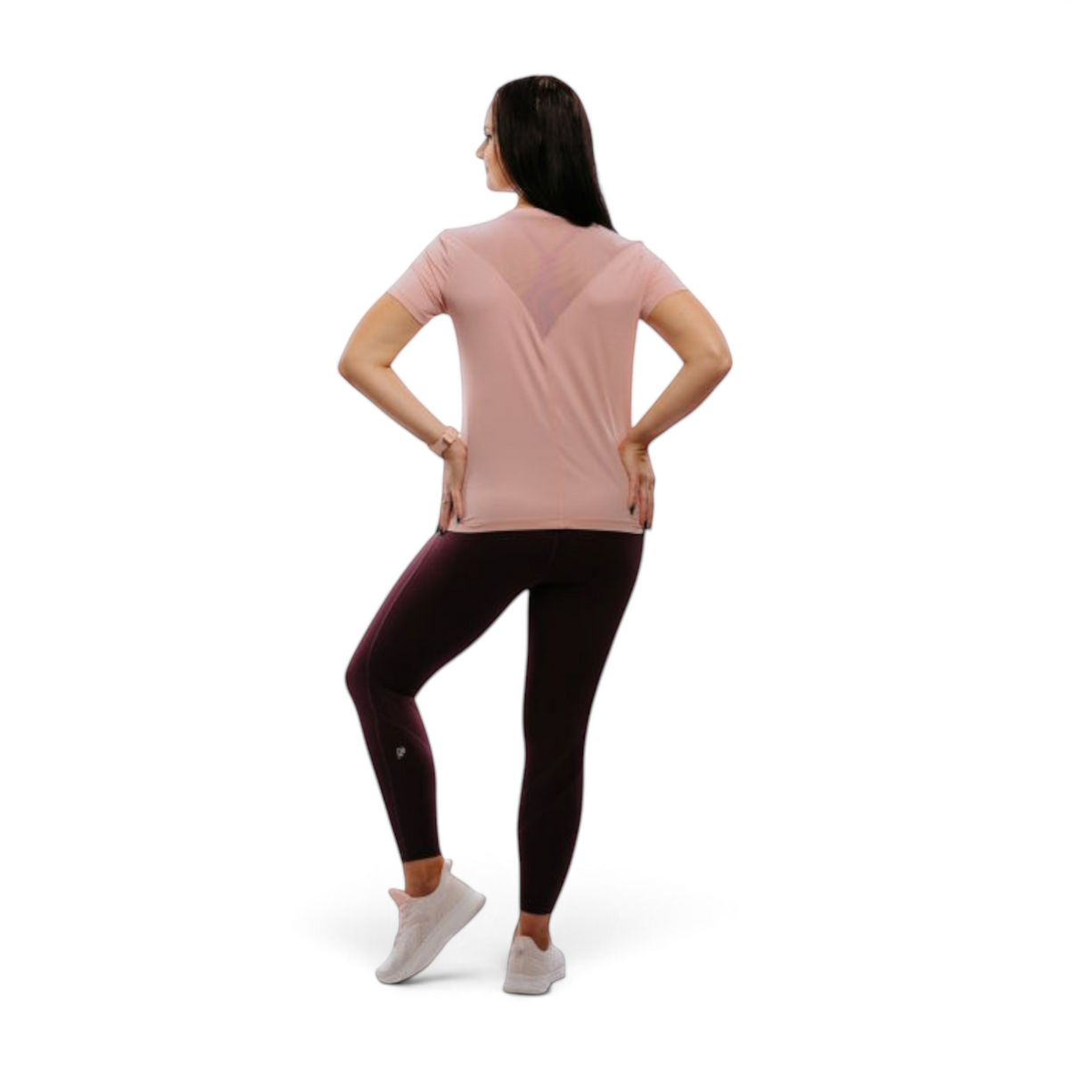 FRG model wearing ANTA purple yoga tight crop pants and a light pink t-shirt, back view against a white background.