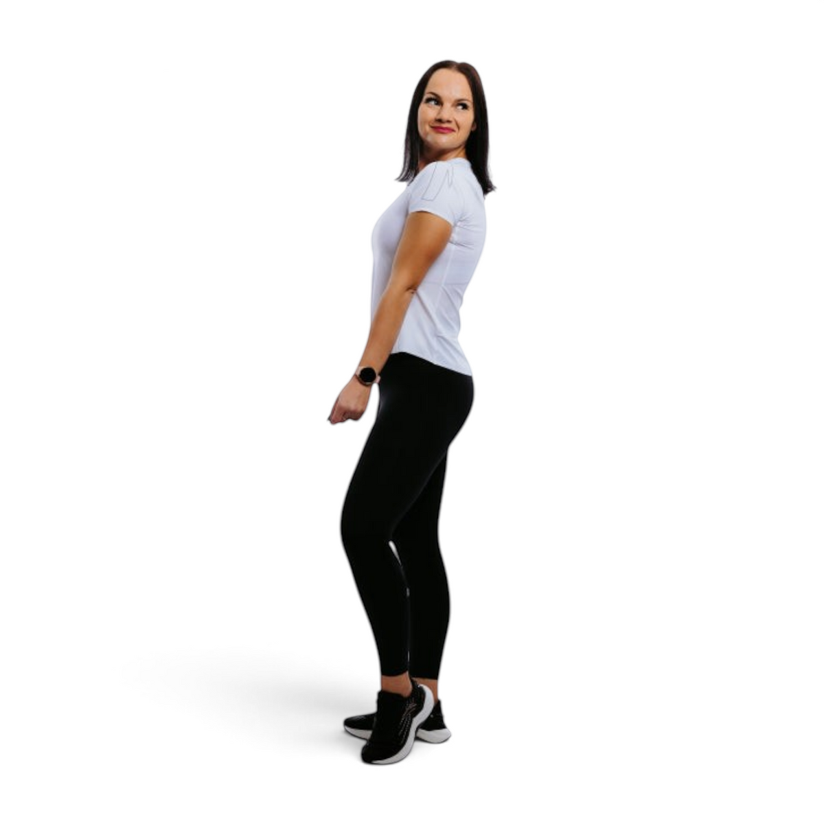 FRG ANTA yoga crop pants in basic black worn by a woman in a white athletic top and black sneakers